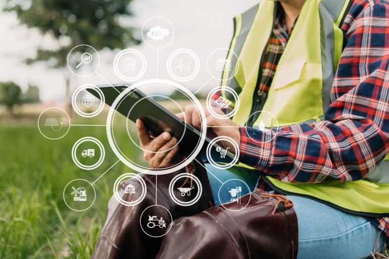 Agriculture technology farmer woman holding tablet or tablet technology to research about agriculture problems analysis data and visual icon