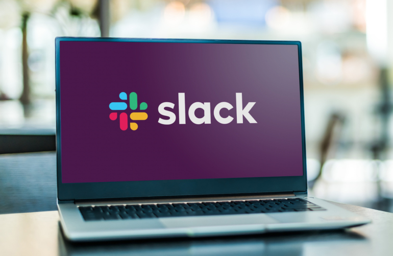 A computer with the Slack logo.